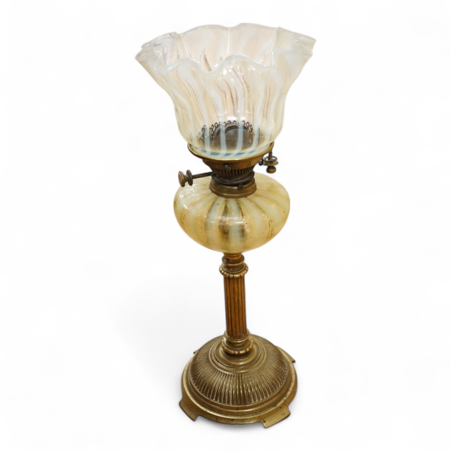 An Edwardian vaseline glass and brass oil lamp and shade, 56cm high